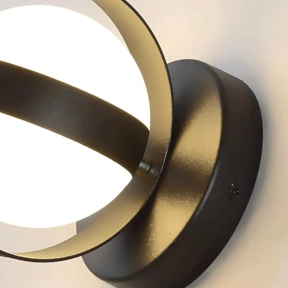 Noctis | Runde LED-Wandleuchte in Schwarz & Gold