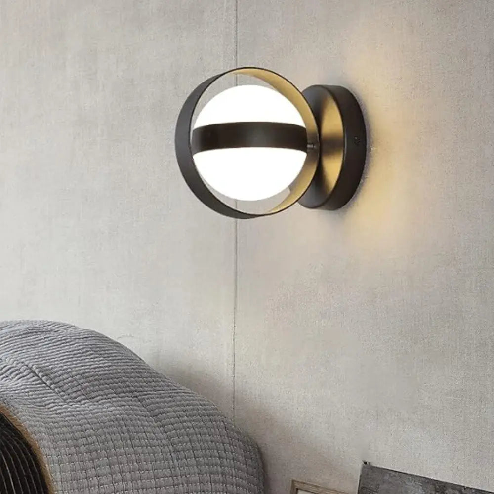 Noctis | Runde LED-Wandleuchte in Schwarz & Gold