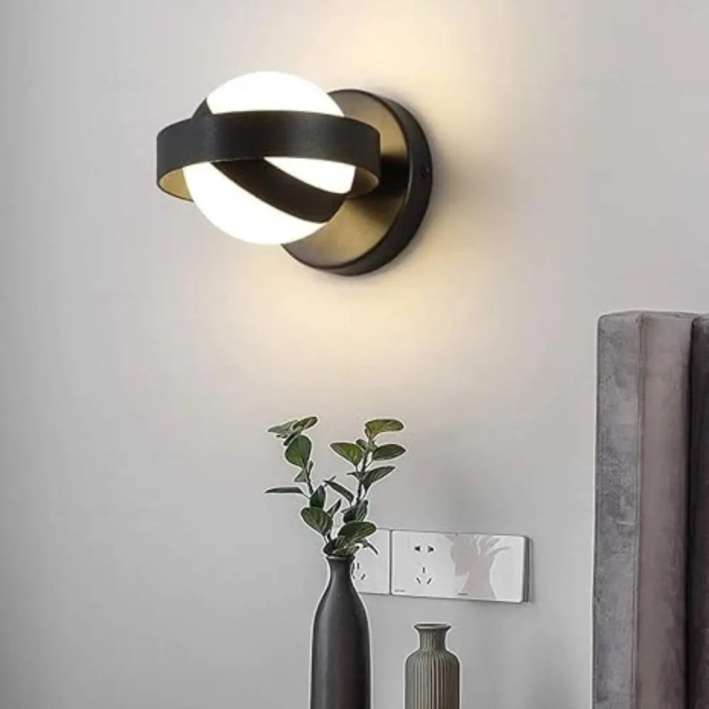 Noctis | Runde LED-Wandleuchte in Schwarz & Gold